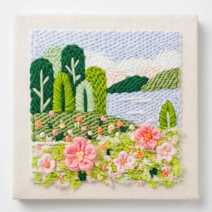 Lakeside Bloom handmade punch needle art with pink flowers and green trees by Calivra Craft