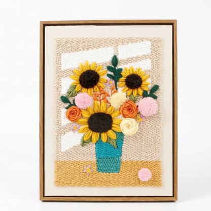 Calivra Craft Cozy Window Sunflower Punch Needle Kit featuring textured floral embroidery in a frame